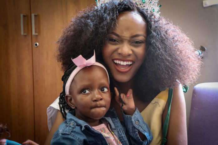 Miss World South Africa, Dr. Claude Mashego, with Mimmie at the Uthando Centre