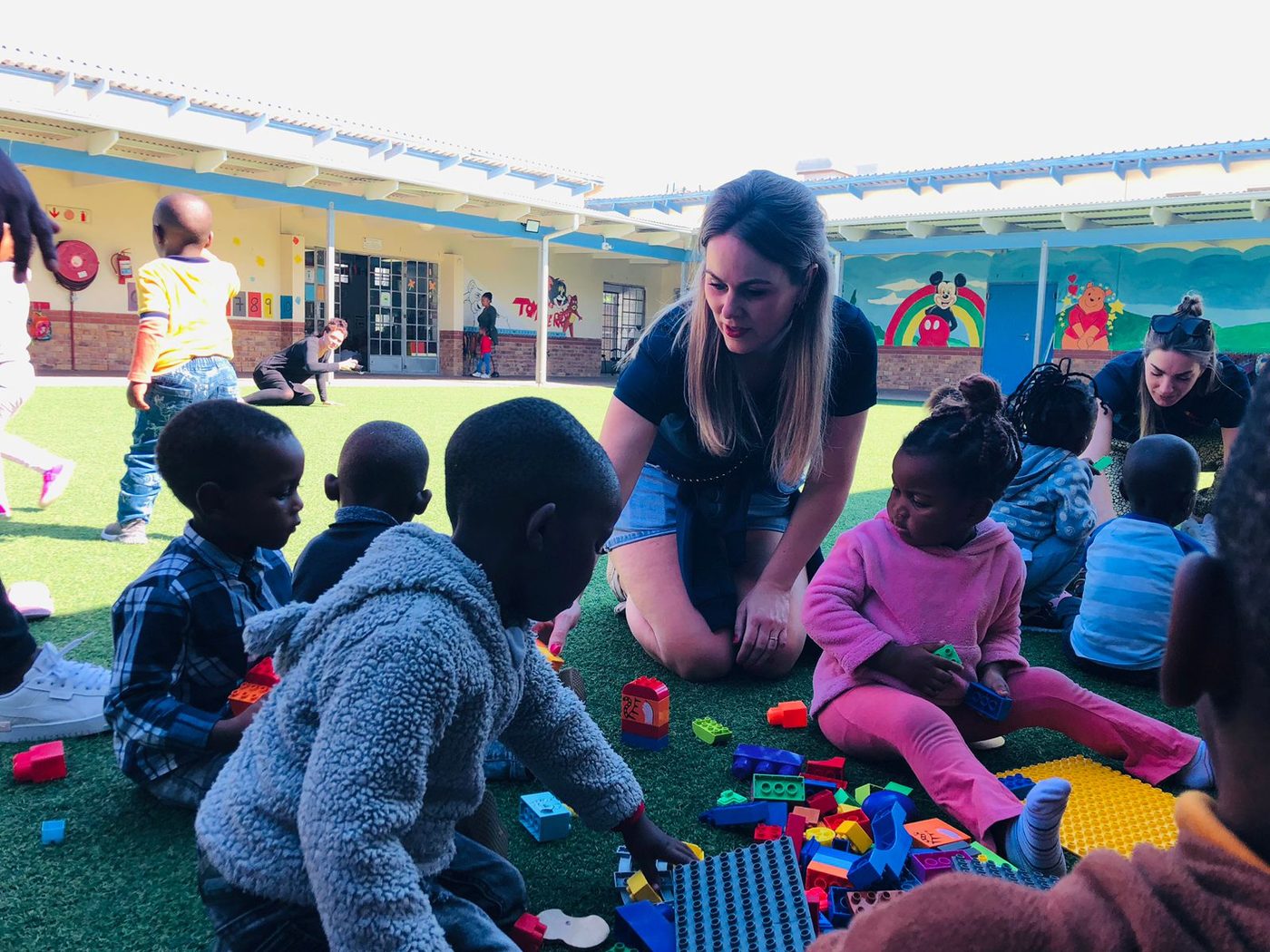 Young children playing with building blocks at an Afrika Tikkun early learning centre